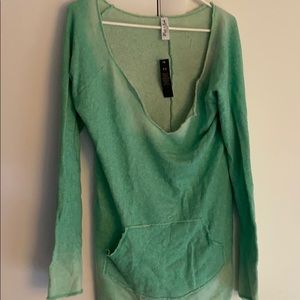 Loose green sweater